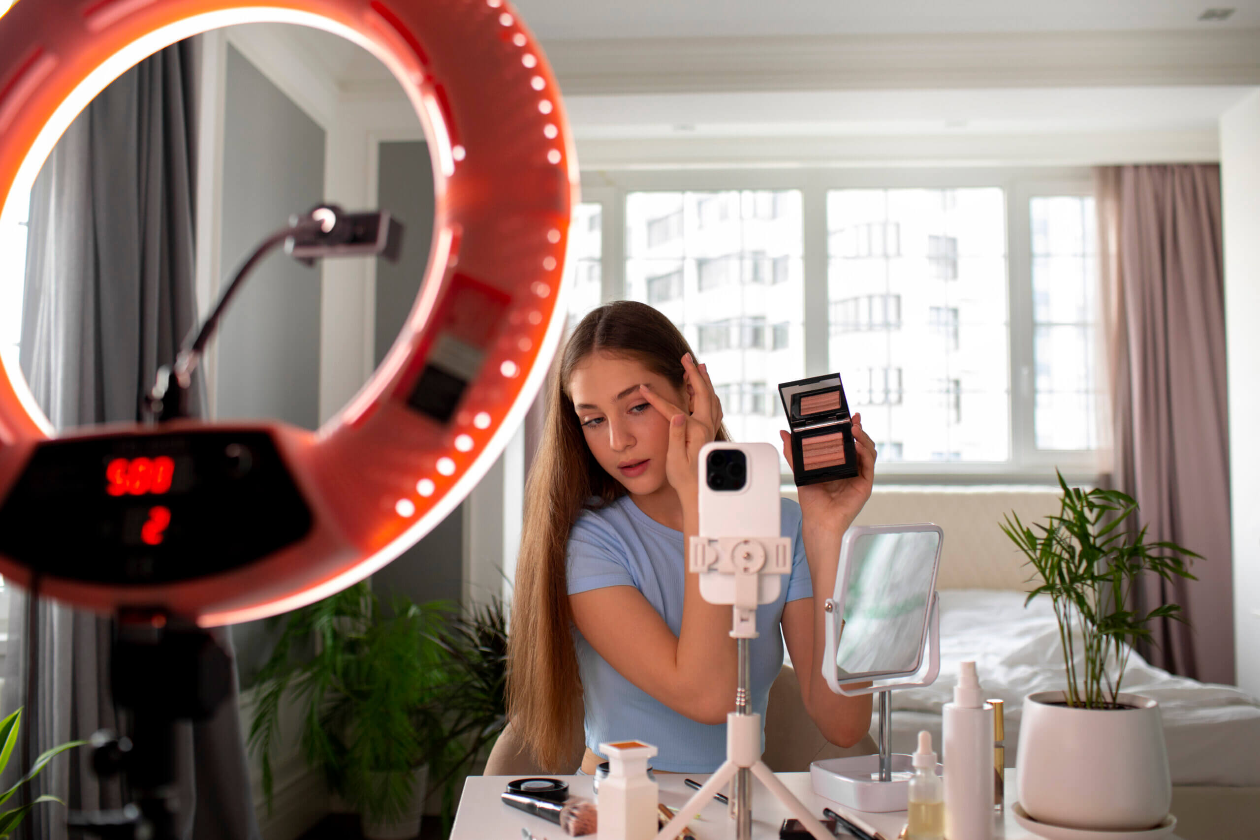 medium shot girl recording her makeup routine scaled